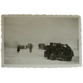 Wehrmacht technicians inspect abandoned Soviet truck GAZ-AA " Polutorka "
